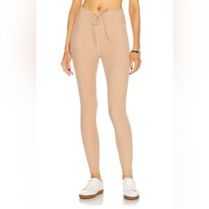 NWT. Year of Ours thermal hockey leggings in tan. Size medium.